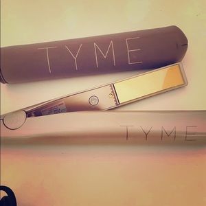 TYME iron & heat sleeve. Curl & straightens hair.
